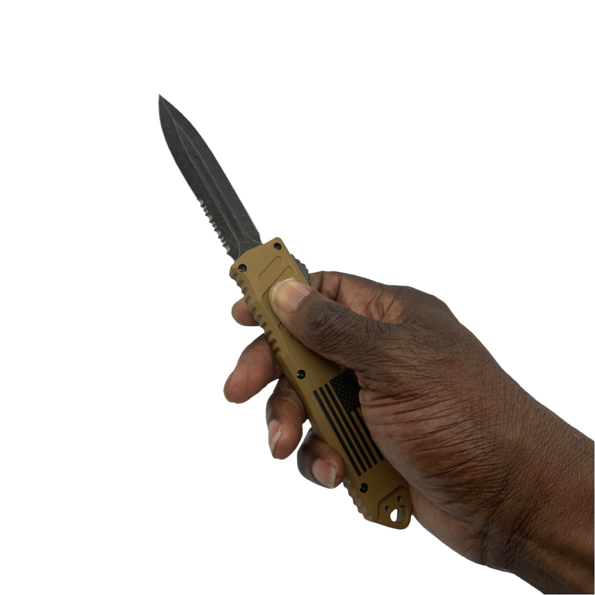 Person holding Armed Force Tactical OTF automatic knife with tan handle and black tactical blade