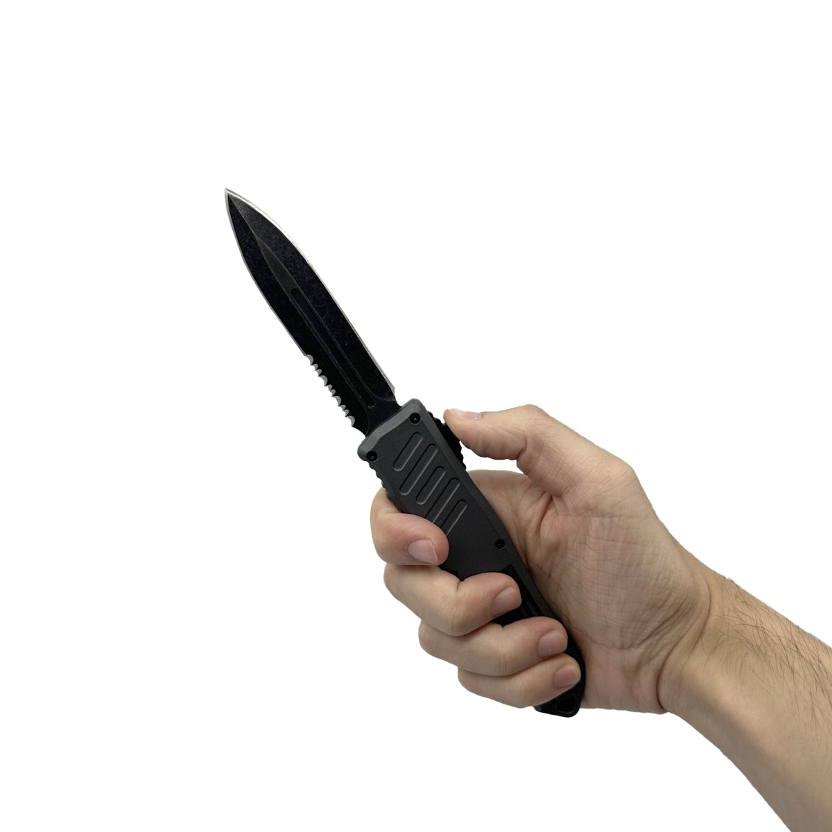 Person holding Armed Force Tactical OTF automatic knife with black handle and matte blade
