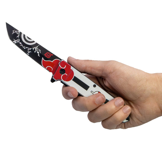 ElitEdge 9-inch anime spring assisted knife with red and white tanto blade shown in hand for grip and size reference.